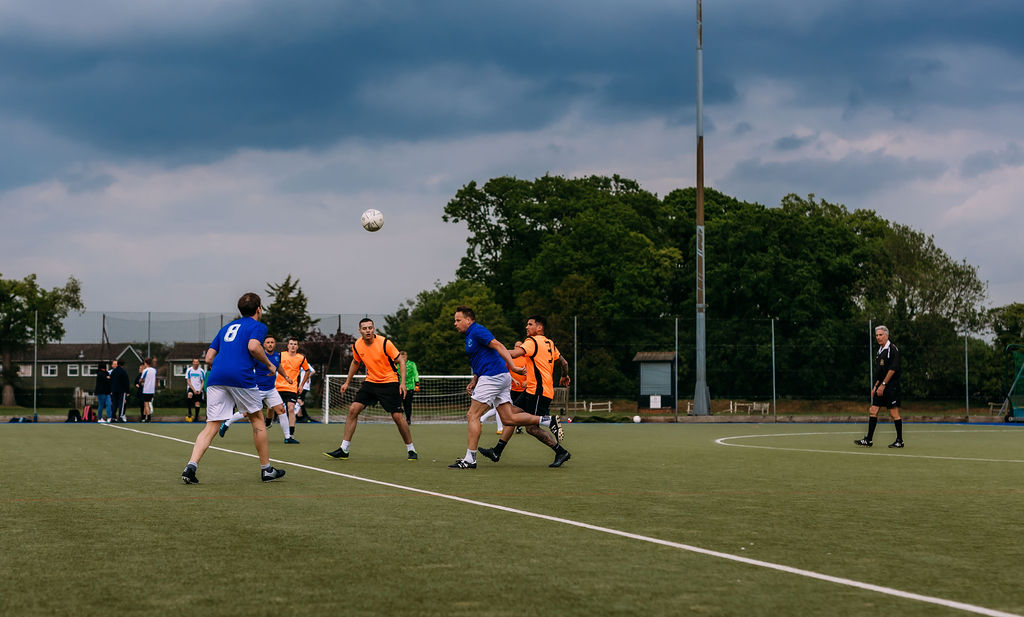 Football tournament on pitch