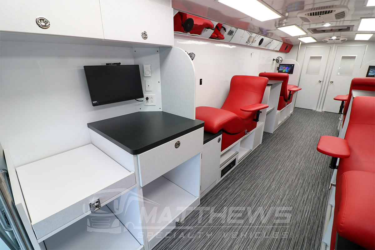 Altro Transflor Wood in Iron Bamboo installed on a Matthews Specialty vehicles Bloodmobile