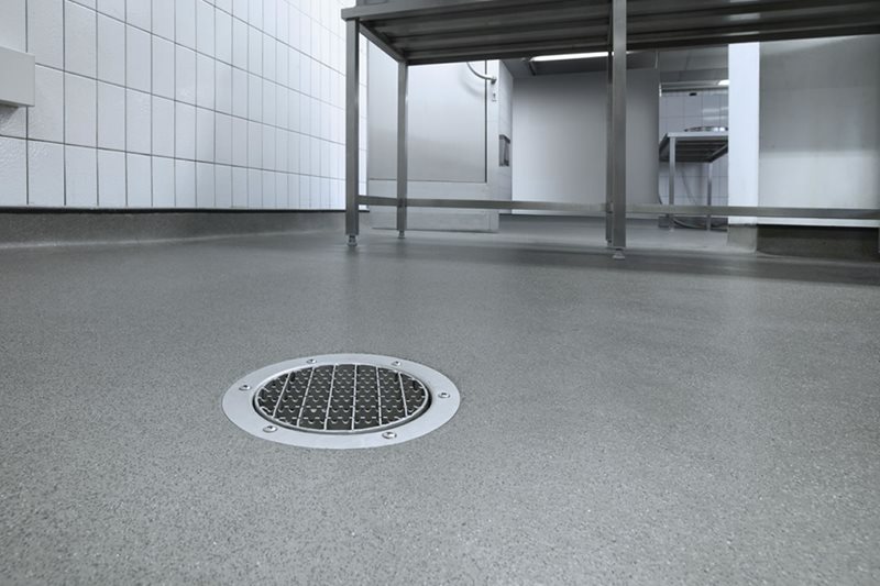 Altro Stronghold laid in a commercial kitchen around a drain.