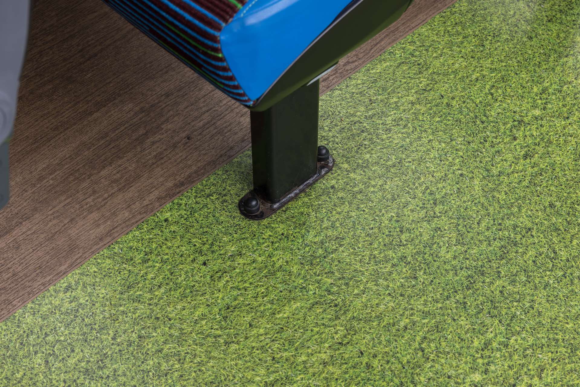 Altro Transflor Metris Custom in Grass 1 installed with Altro Transflor Wood on the Go North East Voltra fleet