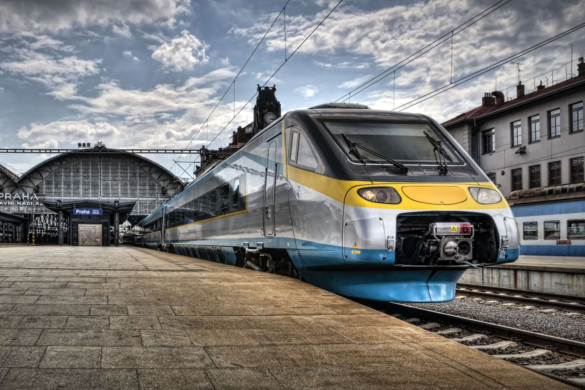 An intercity train waiting at a Polish station.