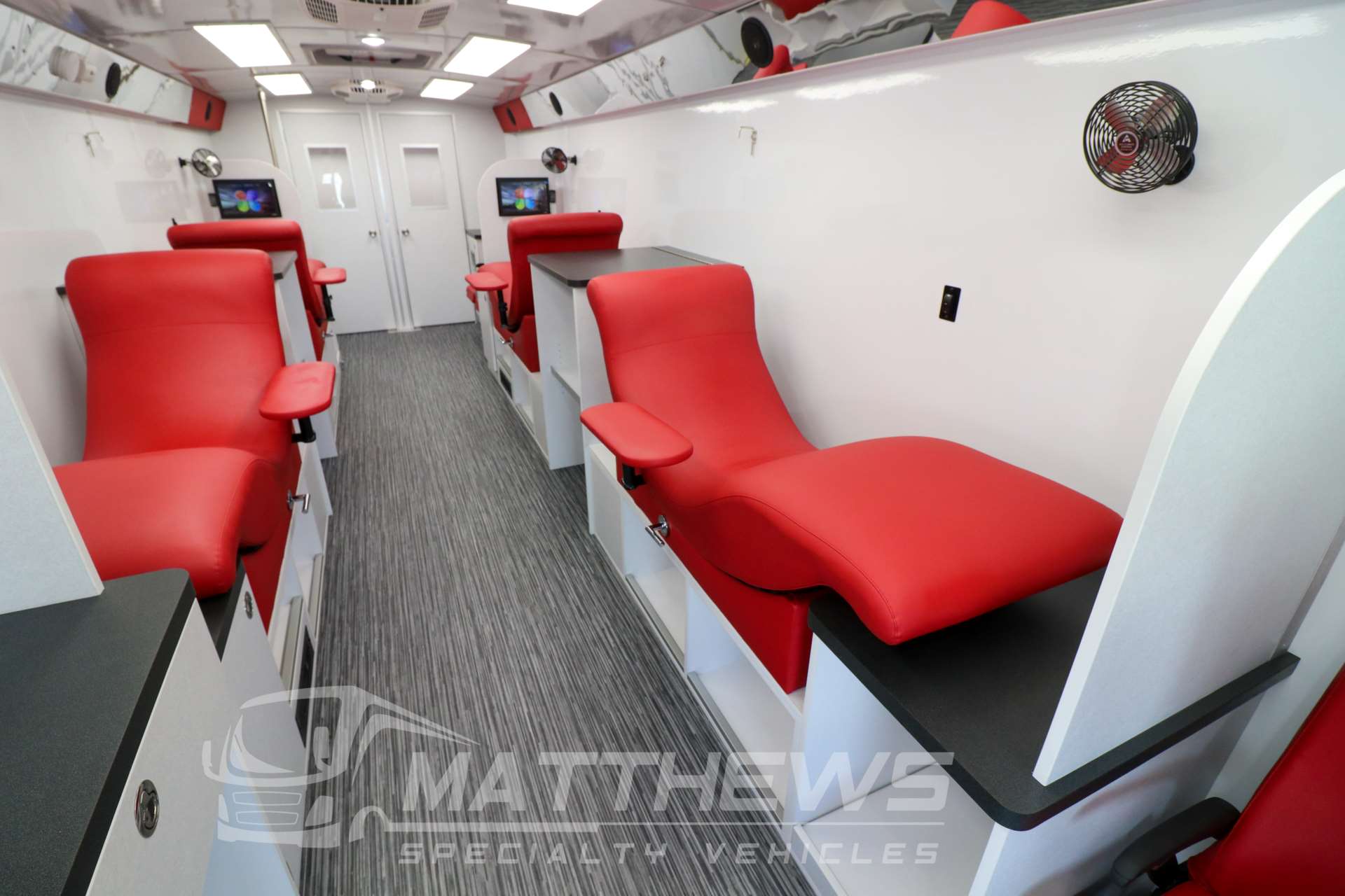 Altro Transflor Wood in Iron Bamboo installed in the Matthews Specialty Vehicles Bloodmobile.